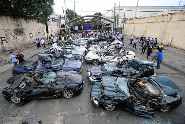 philippines President destroys $5.5 million worth of luxury cars