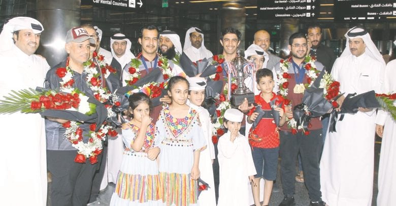 Qatar bowling team return to a warm welcome