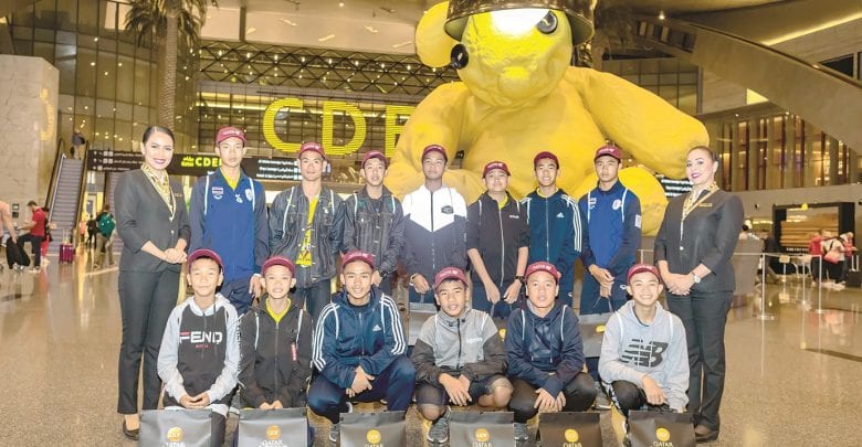 QA flies 12 Thai boys rescued from cave to UK