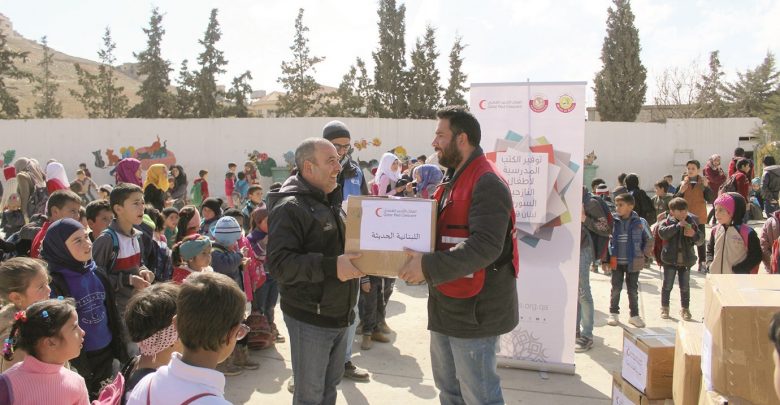 QRCS distributes winter aid to Syrian refugees