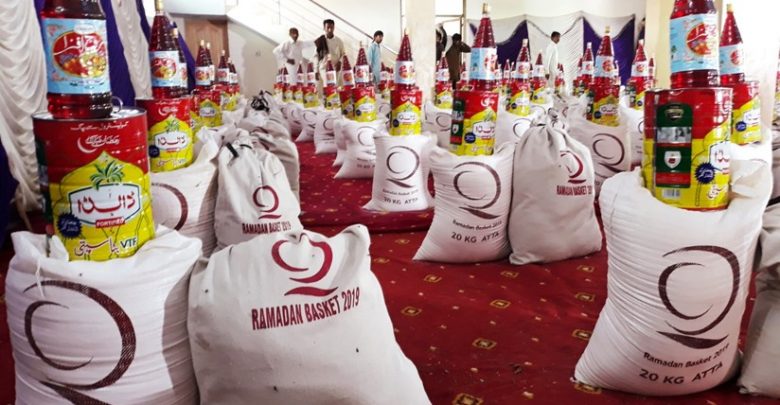 QC distributes food baskets and Eid clothes in Pakistan