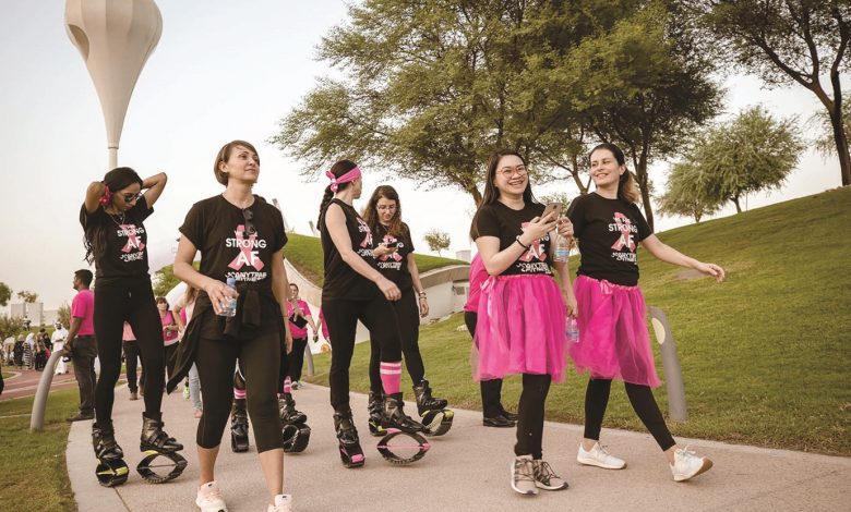 A community walk in Education City to raise breast cancer awareness