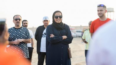 Sheikha Al Mayassa participates in an initiative to collect plastics from Fariha beach