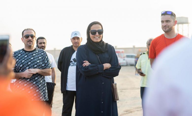 Sheikha Al Mayassa participates in an initiative to collect plastics from Fariha beach