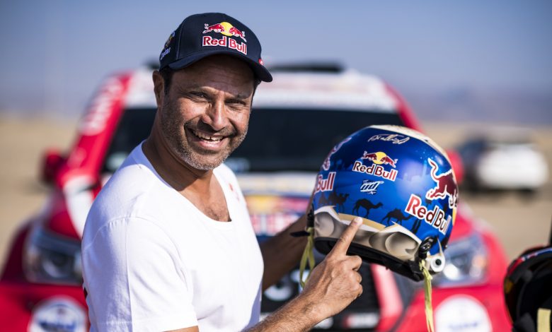 Rally Champion Nasser Al Attiyah turns engine on at the 2020 Dakar; Rally Start Podium in Saudi Arabia