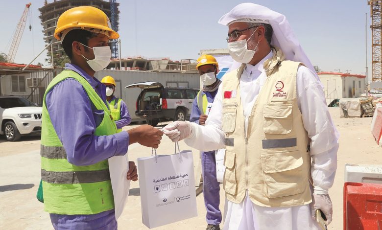 Qatar Charity distributes 900 health kits to workers in Lusail