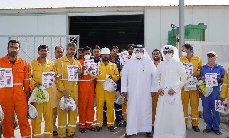 Qatar Charity distributes personal hygiene and food items and educational flyers to workers
