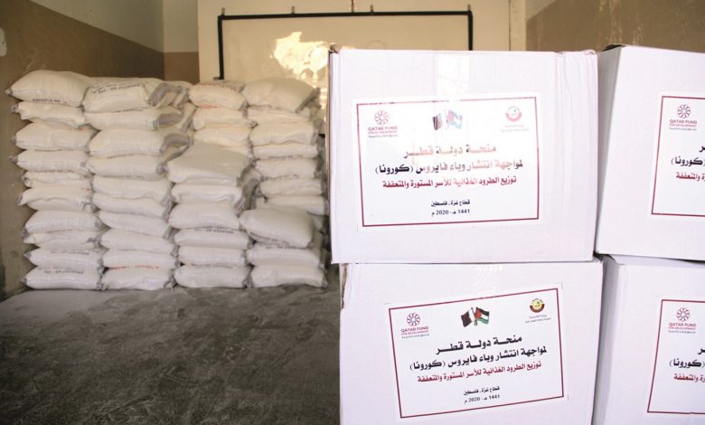 Qatar panel distributes food parcels to needy Gaza families