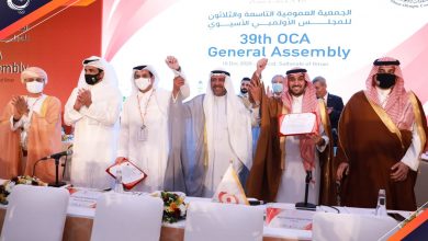 Sportsmanship between delegations of Qatar and Saudi Arabia after the announcement of result for hosting Asian Games