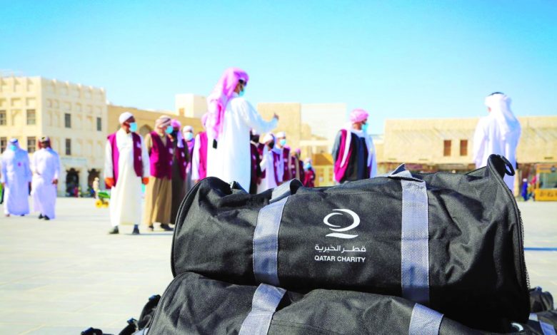 Qatar Charity continues to distribute winter bags to workers