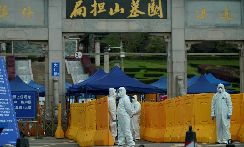 China moves to confront the ghost of Wuhan's virus and isolate cities