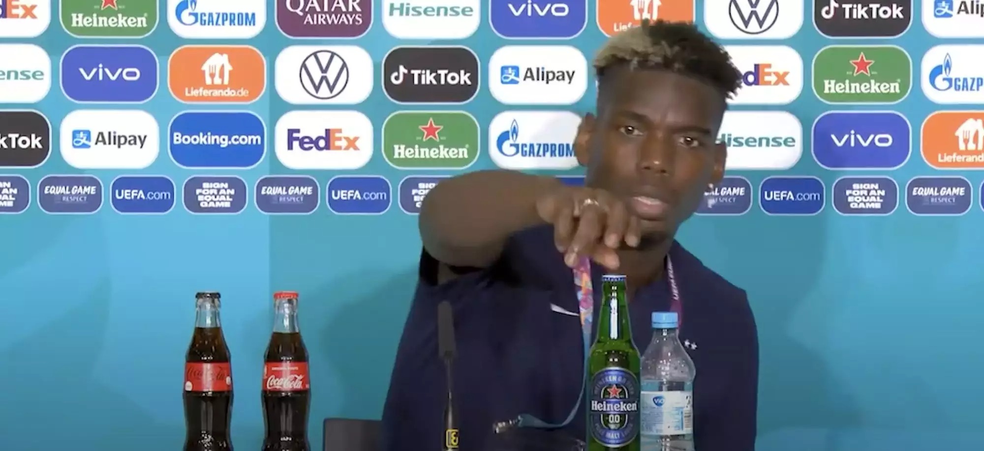 Paul Pogba removed a bottle of beer from a press conference