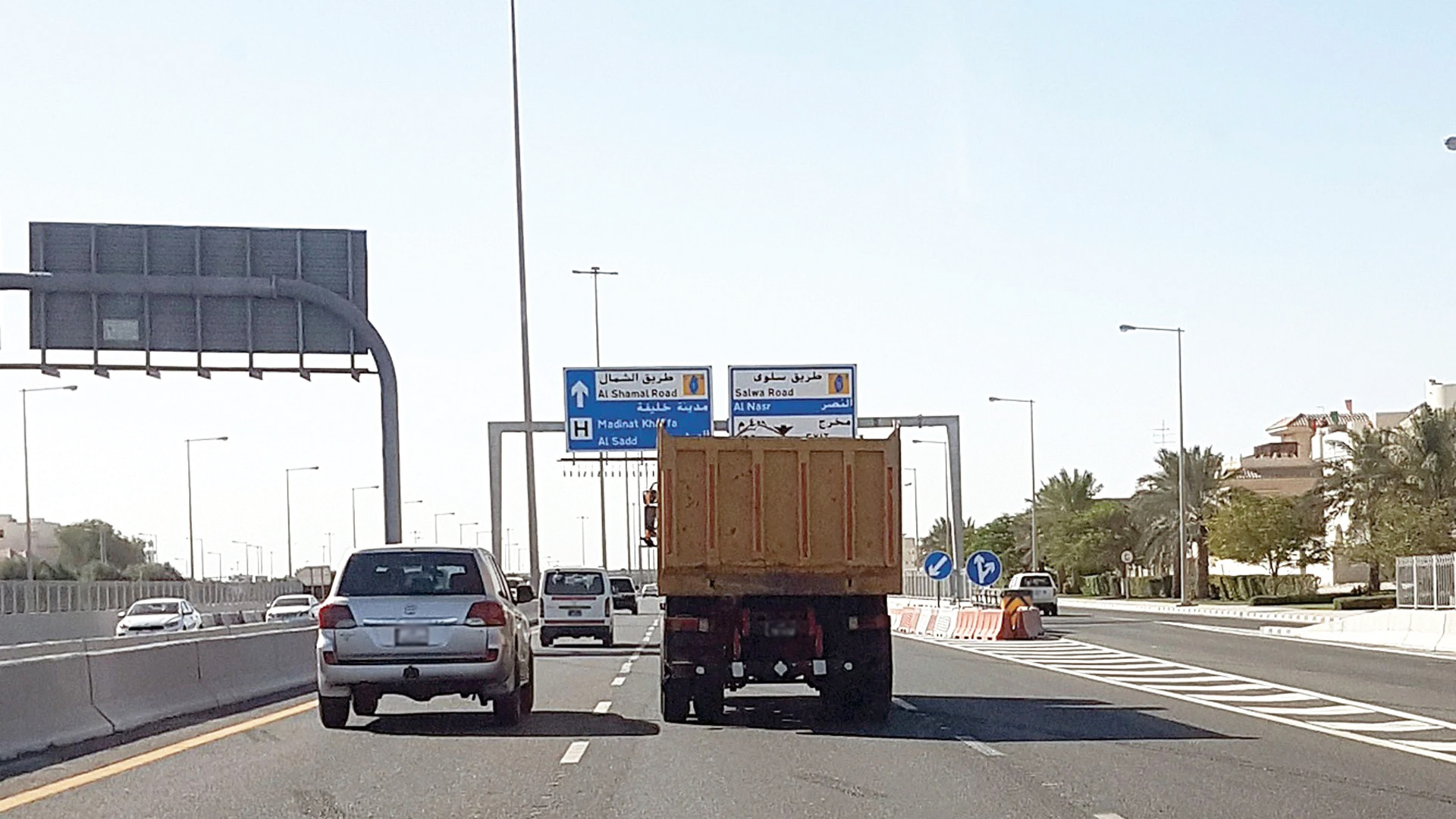 Trucks driving in center lanes