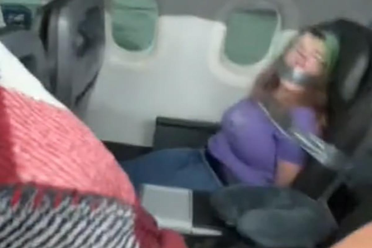 Woman is duct-taped to chair on American Airlines' flight.. What’s the story?