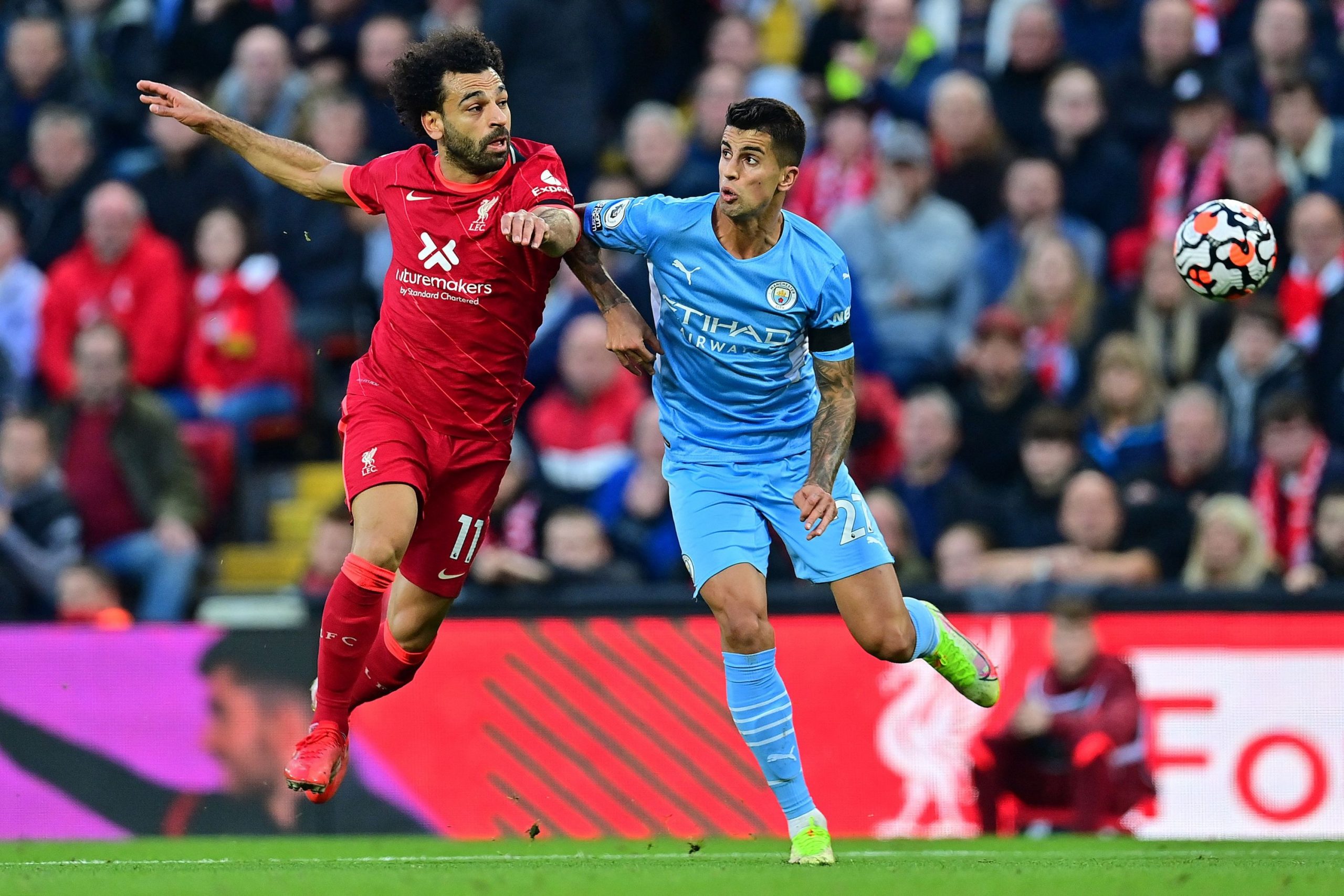 Manchester City fight back twice in thrilling 2-2 draw at Liverpool