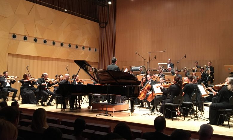 Qatar Philharmonic Orchestra performs football anthems