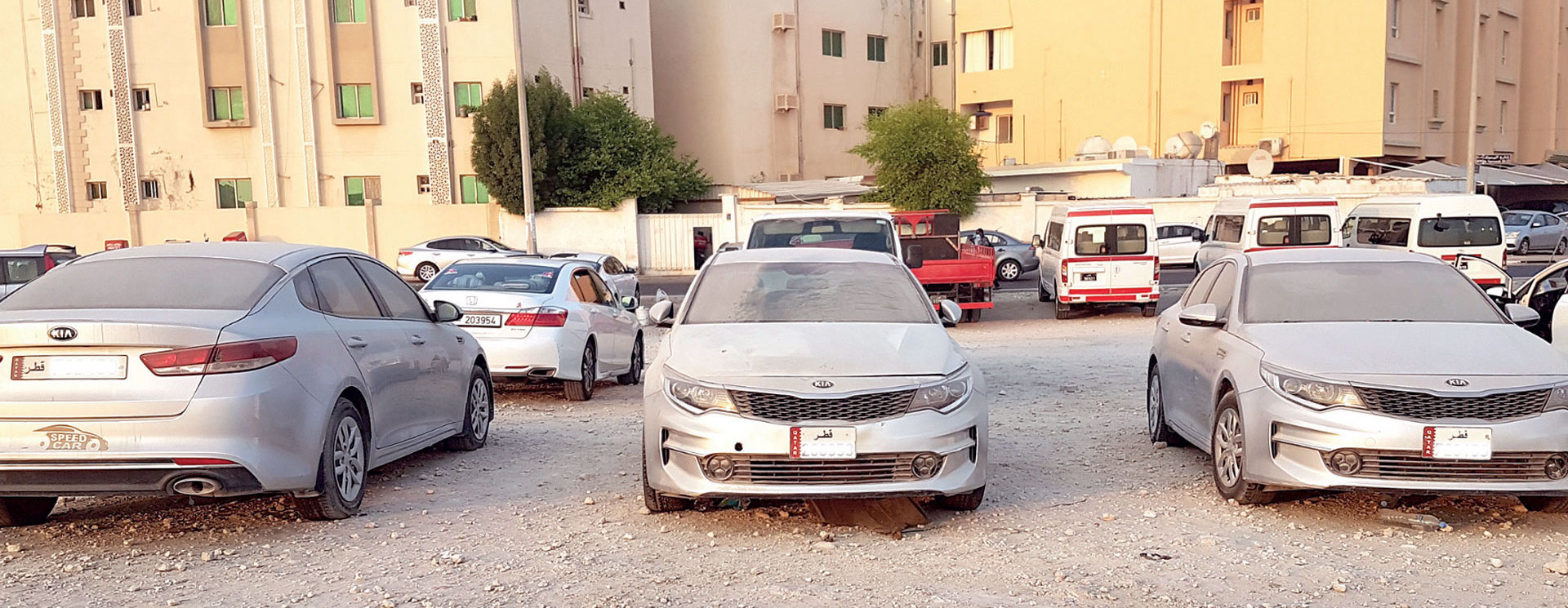 Abandoned cars distort the streets of New Al-Hitmi