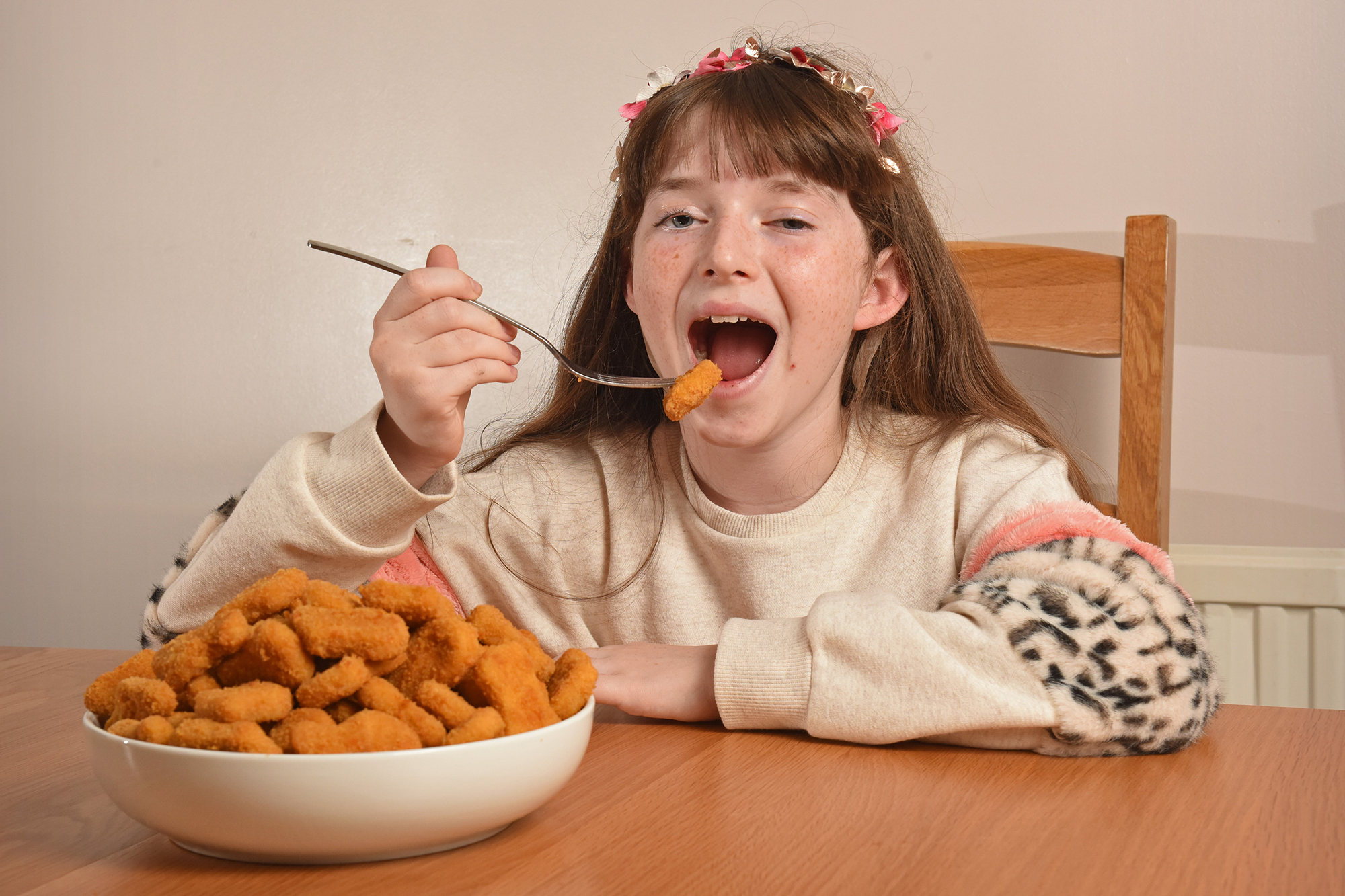 Girl makes 'miracle' recovery after only eating chicken nuggets for a decade
