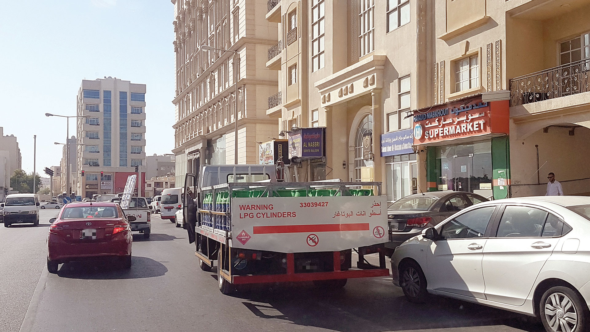 Parking in undesignated spaces on Al-Mansoura Street