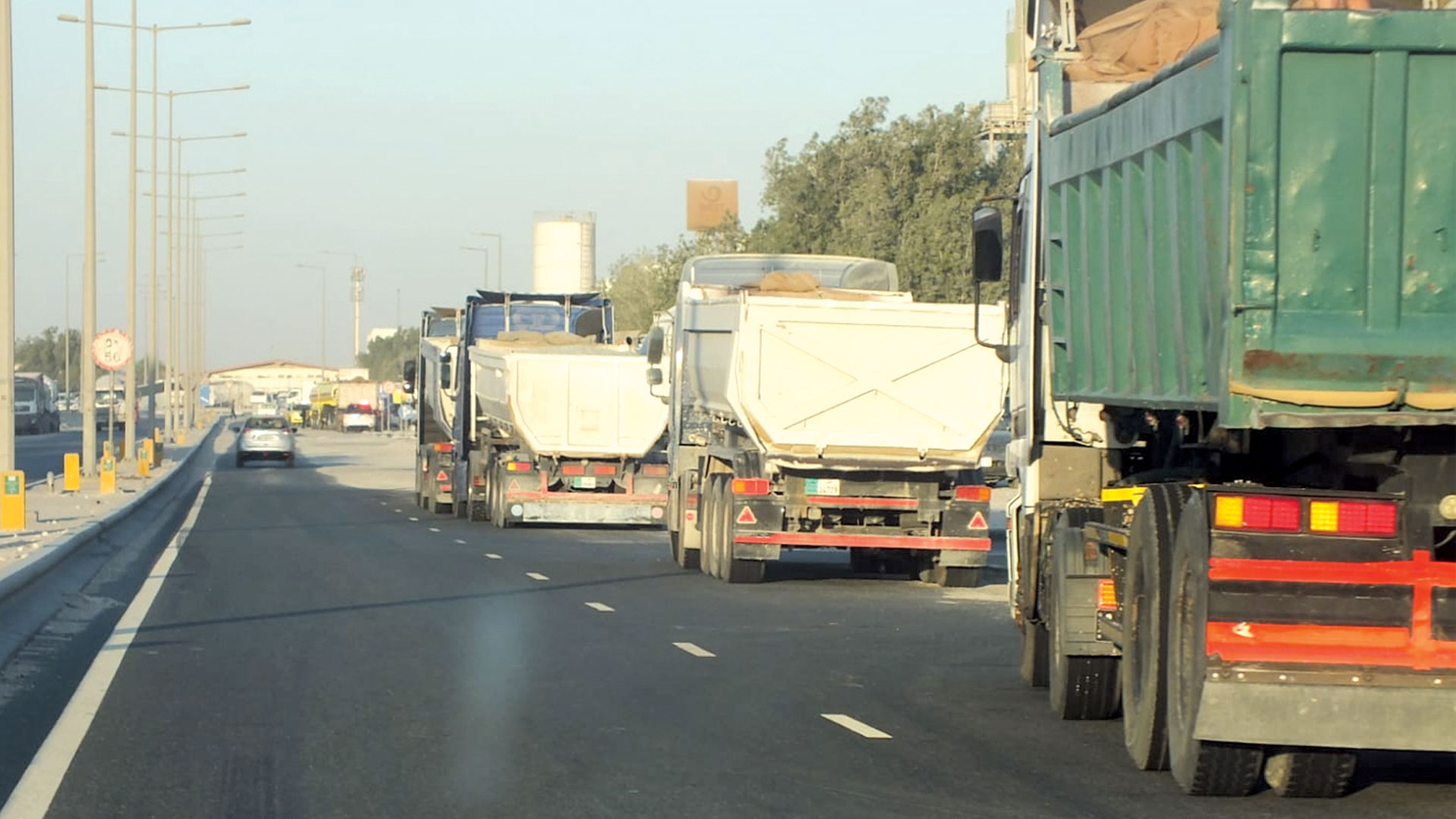 Industrial Area road lanes turned into truck stops