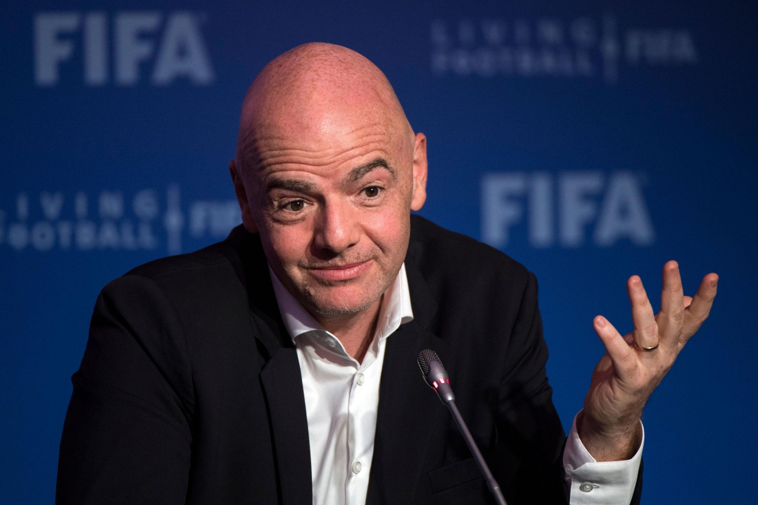 Why did the FIFA president and his family move to Doha?
