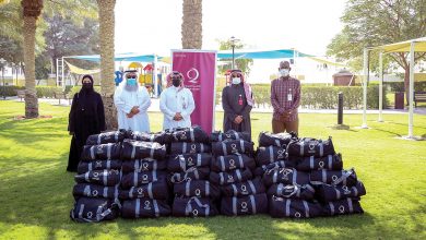 Workers receive 500 winter bags from Qatar Charity