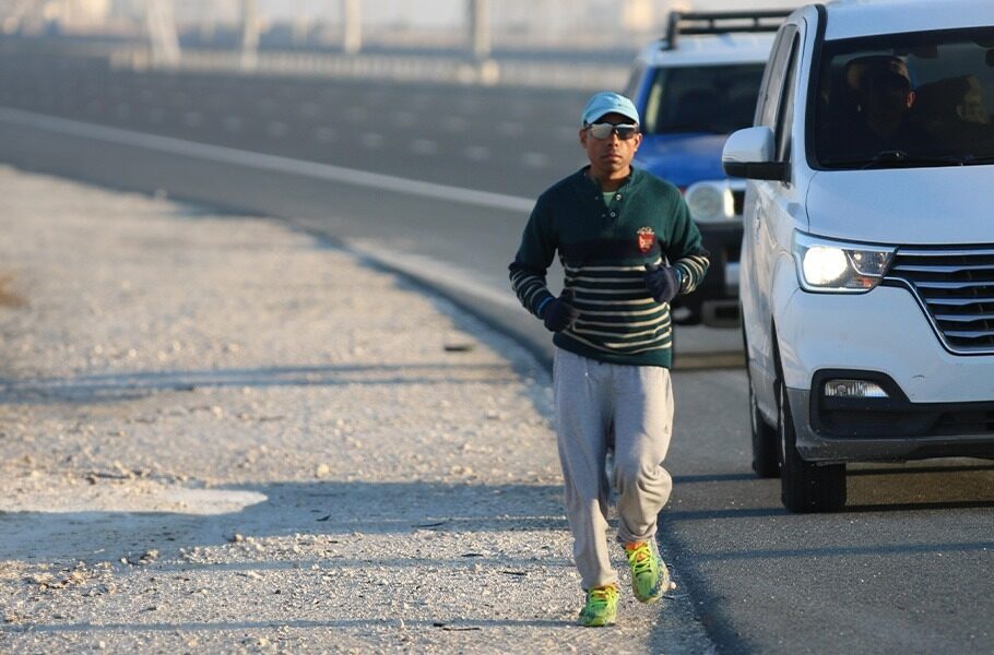 New Guinness World Record: Fastest Qatar Crossing on Foot