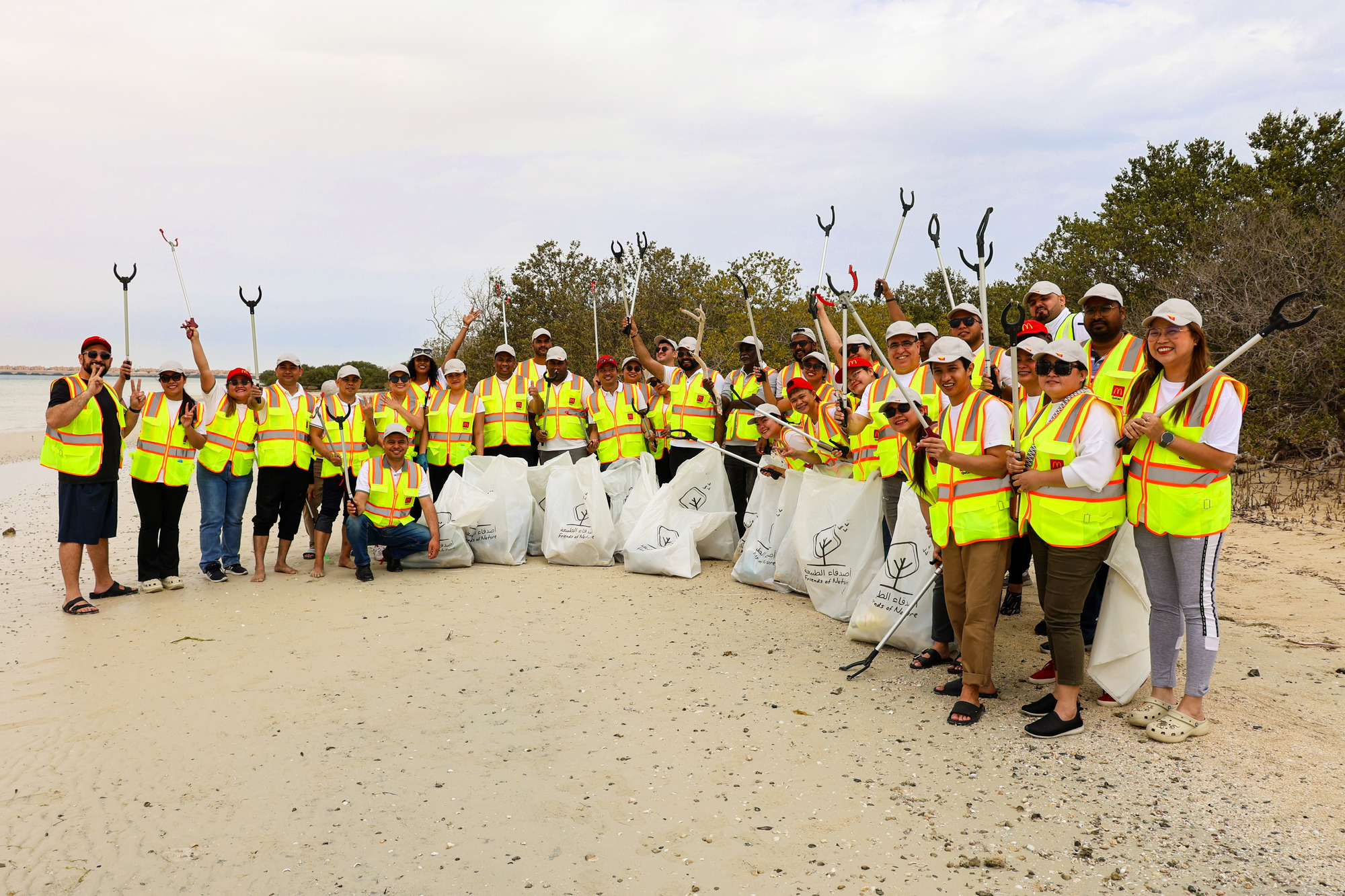 McDonald’s Qatar Employees Unite for Environmental Action, Planting Mangroves and Cleaning Beaches